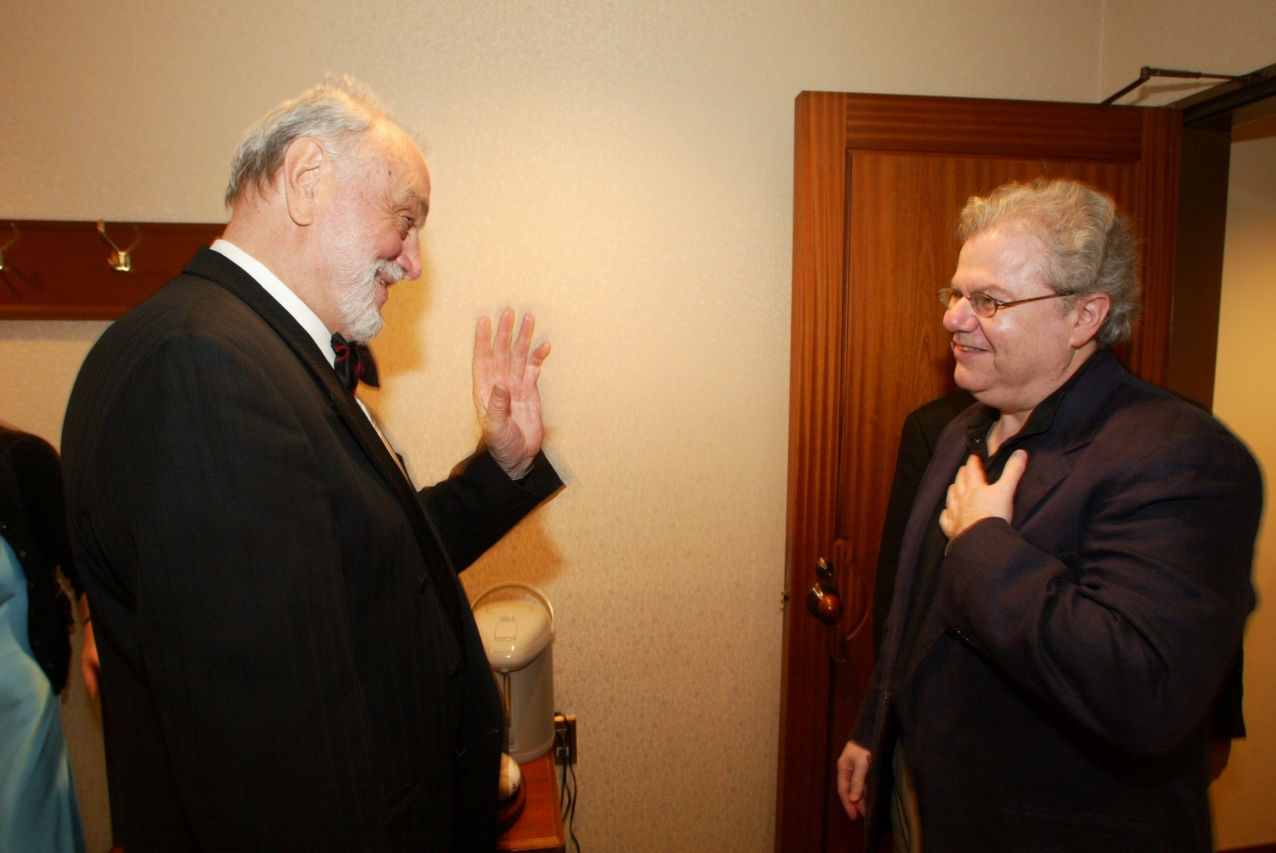 Music Director Kurt Masur and pianist Emanuel Ax greet each other.