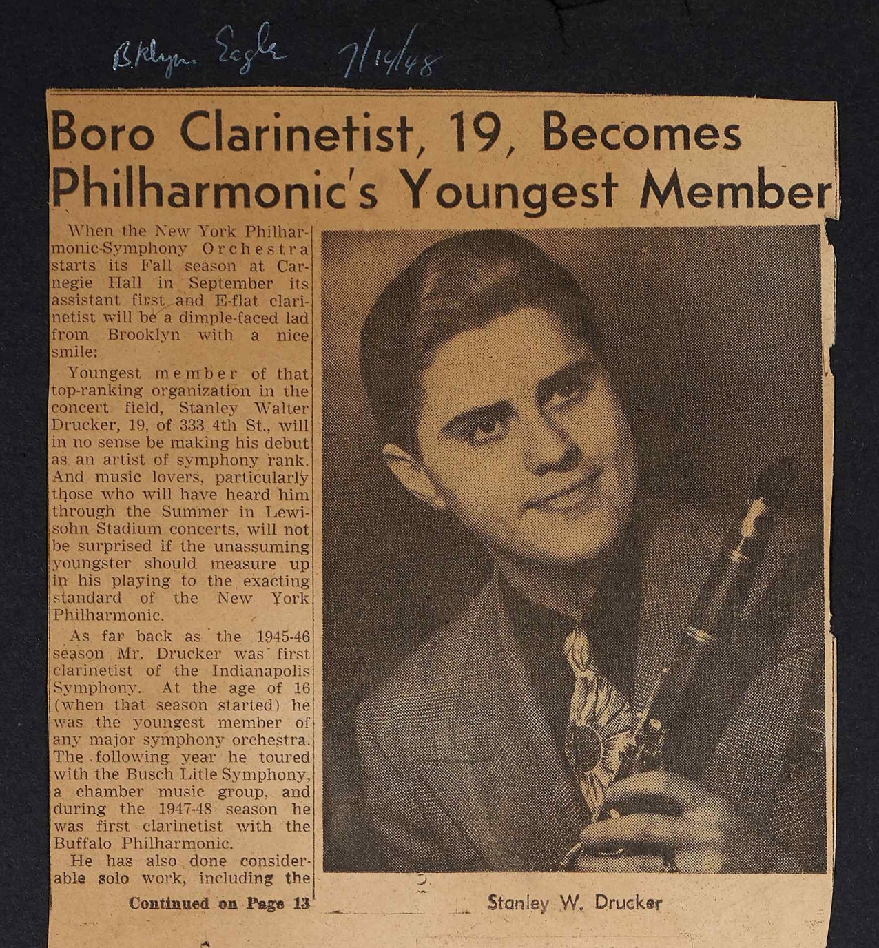 Press clipping from the Brooklyn Eagle, dated July 14, 1948. Headline: Boro Clarinetist, 19, Becomes Philharmonic's Youngest Member. A young Stanley Drucker is pictured.