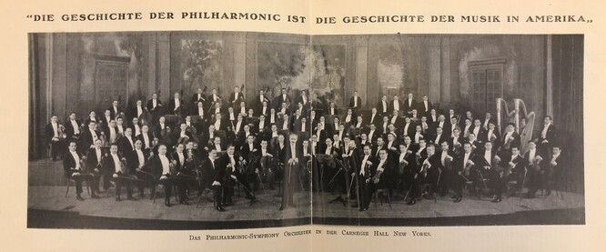 Photograph of the full New York Philharmonic orchestra on stage