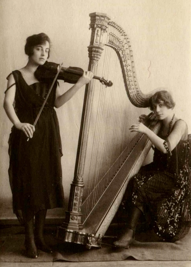 Portrait of Trudy Goldner with violin and Steffy Goldner with harp.