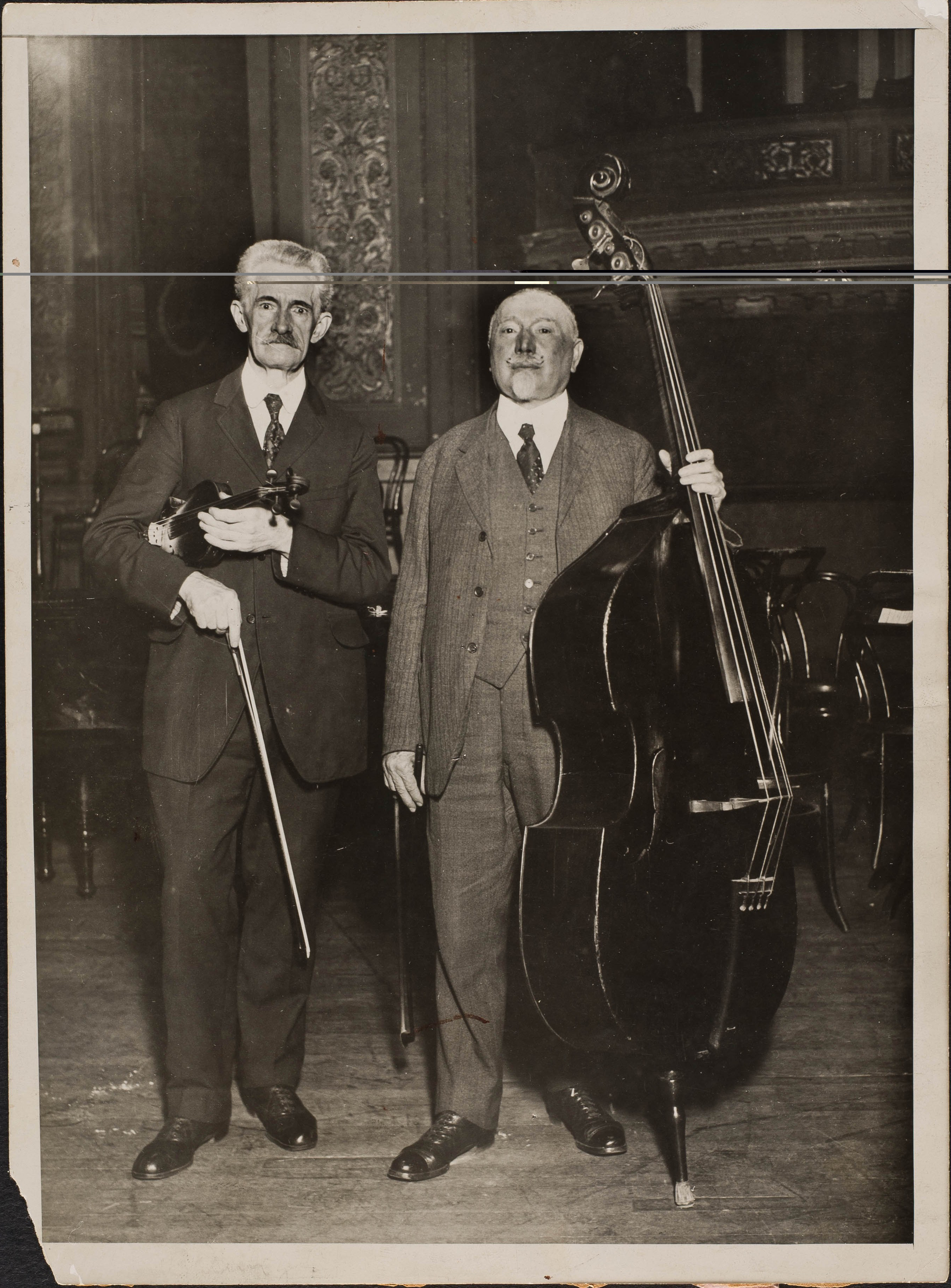 Henry Boewig, Philharmonic Librarian and violinist (1888-1918) with Ludwig Manoly, a member of the Philharmonic bass section (1879-1927)